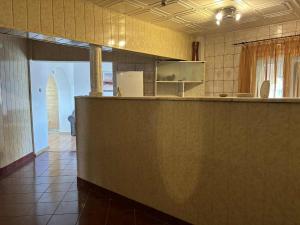 Kuchyň nebo kuchyňský kout v ubytování Apartament Ultra Central