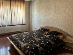 Postel nebo postele na pokoji v ubytování Apartament Ultra Central
