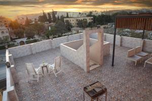 En balkon eller terrasse på Cozy Rooftop by the Pyramids