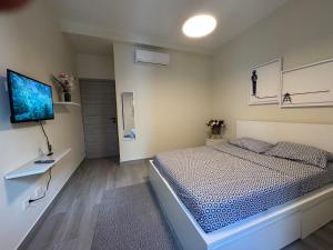 Postel nebo postele na pokoji v ubytování Family paradise in Punta Cana