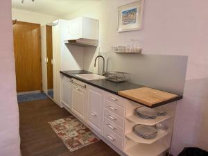 Køkken eller tekøkken på Champfer Garden Apartment