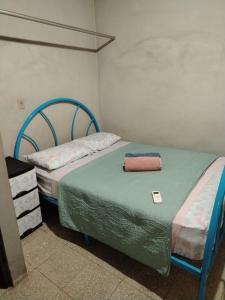 Postel nebo postele na pokoji v ubytování Hospedaje carvajal