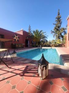 Bazén v ubytování Ferme des Oliviers - Villa de Charme avec Vue Nature nebo v jeho okolí