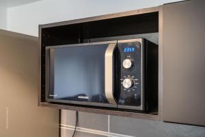 Et tv og/eller underholdning på Central and peaceful apartment 10 min Disney - 4P