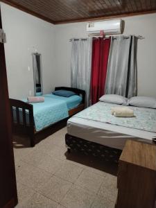 Postel nebo postele na pokoji v ubytování Hospedaje carvajal