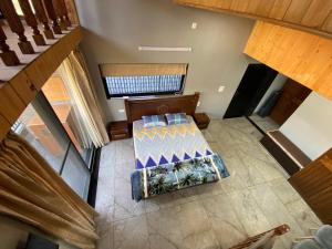 - une chambre avec un lit dans l'établissement Chahat Villa, à Palampur