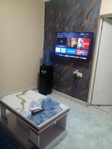 TV a/nebo společenská místnost v ubytování EsMash Studio Machine lanet Nakuru