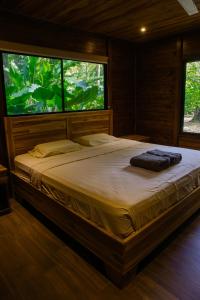 En eller flere senge i et værelse på Casa Arima