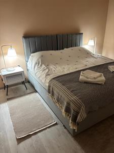 En eller flere senge i et værelse på Giardino