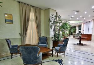 Khu vực ghế ngồi tại Flat 02 Quartos Long Stay Alvorada Vila Olímpia +29 ảnh