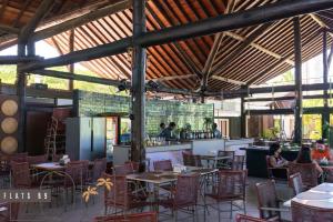 En restaurant eller et andet spisested på Nannai Residence Porto de Galinhas By LOUI