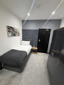 En eller flere senge i et værelse på Woodhouse Hotel Blackpool Promenade