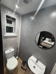 Et badeværelse på Woodhouse Hotel Blackpool Promenade