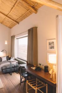 Posezení v ubytování Titilaka by Andean