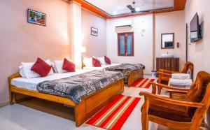 Giường trong phòng chung tại Hotel Jungle Palace Resort