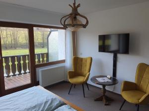 Et tv og/eller underholdning på Pension-Gästehaus Waldhof