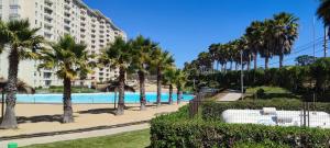 Hồ bơi trong/gần Depto Laguna Vista Hermoso Comodo Familiar