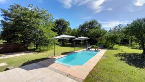 Swimmingpoolen hos eller tæt på Mahatma Villa Giardino