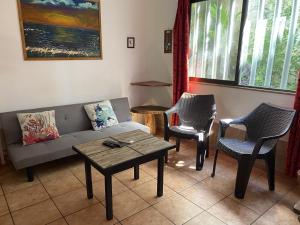 Et opholdsområde på Pacific Jungle Condominium