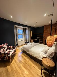 En eller flere senge i et værelse på Gorgeous Oxford Flat