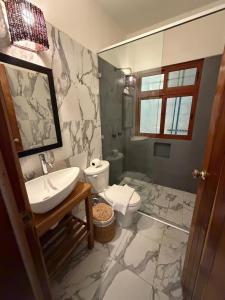 Et badeværelse på Hotel centrico tulum