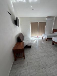 Et tv og/eller underholdning på Hotel centrico tulum