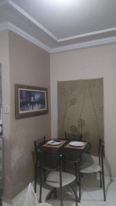 Et opholdsområde på Flat confortável