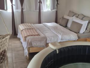 a bedroom with a large bed and a swimming pool at Apartament Casa Dia Sibiu in Sibiu