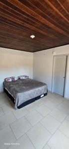 En eller flere senge i et værelse på Sobrado Verde