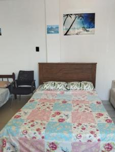 En eller flere senge i et værelse på Suite Penha Beto Carrero World