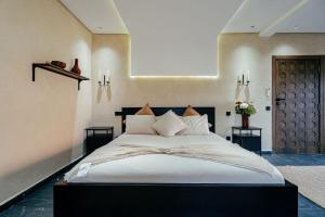 Postel nebo postele na pokoji v ubytování Atlas front + 12 fotografií