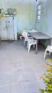 En terrasse eller udendørsområde på CASA Avenida III + 2 billeder