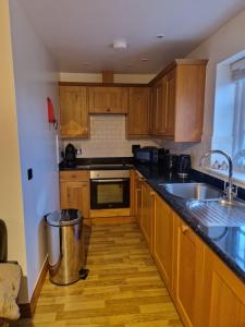 Kuchyň nebo kuchyňský kout v ubytování Mill Lane Farm Holiday Cottages + 14 fotografií