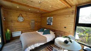 Postel nebo postele na pokoji v ubytování Puerta austral