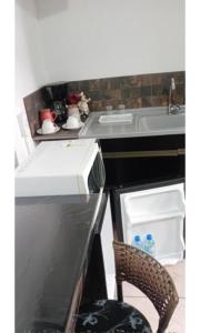 Kuchyň nebo kuchyňský kout v ubytování Suites pousada Ilha do Sol + 56 fotografií