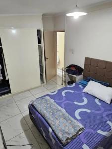 En eller flere senge i et værelse på Viviendas por venir