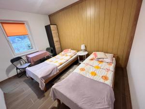 Postel nebo postele na pokoji v ubytování Agroturystyka u Zosi