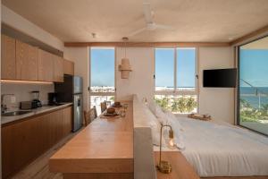 En eller flere senge i et værelse på Greta Puerto Morelos + 77 billeder