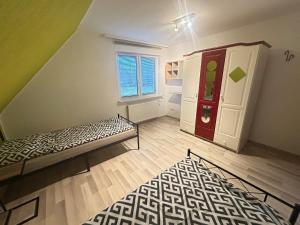 En eller flere senge i et værelse på 3-Zimmerwohnung in Garbsen