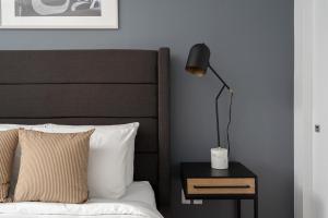 En eller flere senge i et værelse på The Alexander Hotel - Old Montreal