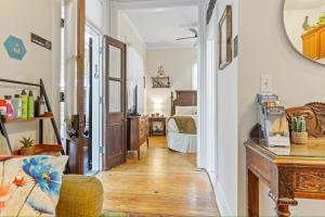 a hallway with a room with a bed at The Island Suite at KW Vacation in Key West