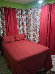 En eller flere senge i et værelse på Kitnet 500m da praia