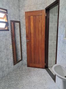 Phòng tắm tại Kitnet 500m da praia