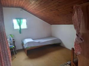 Giường trong phòng chung tại Doña polilla