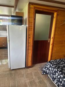 Køkken eller tekøkken på Casa termas guaviyu + 4 billeder