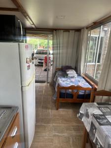 Køkken eller tekøkken på Casa termas guaviyu