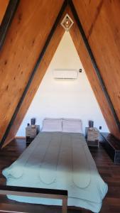 Postel nebo postele na pokoji v ubytování Alpina 406