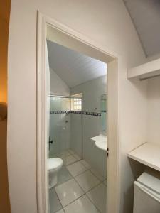 Et badeværelse på Pousada Chalés Jardim das Aguas