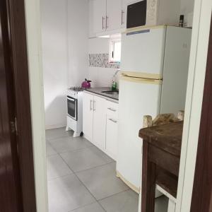 Kuchyň nebo kuchyňský kout v ubytování Casa a 100 nts del mar + 6 fotografií