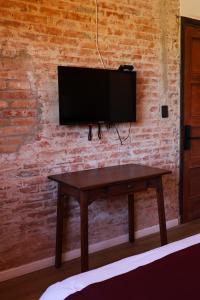 Et tv og/eller underholdning på Hosteria Del Pescador